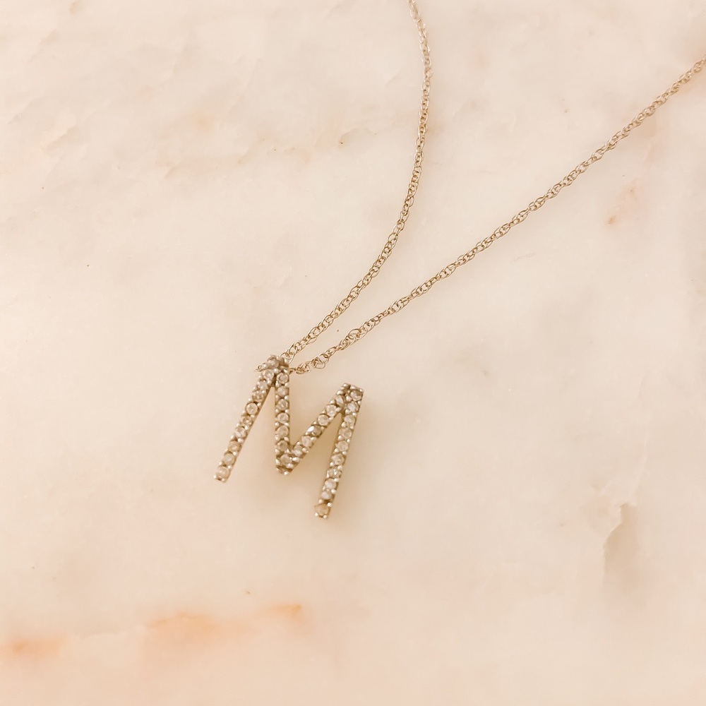 Silver and rhinestone initial “M” necklace